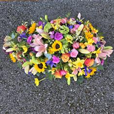 Vibrant casket spray